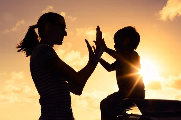 Image of happy mother and child after resolving child arrangements Llanelli
